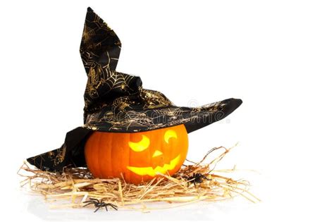Halloween pumpkin wearing a witch hat